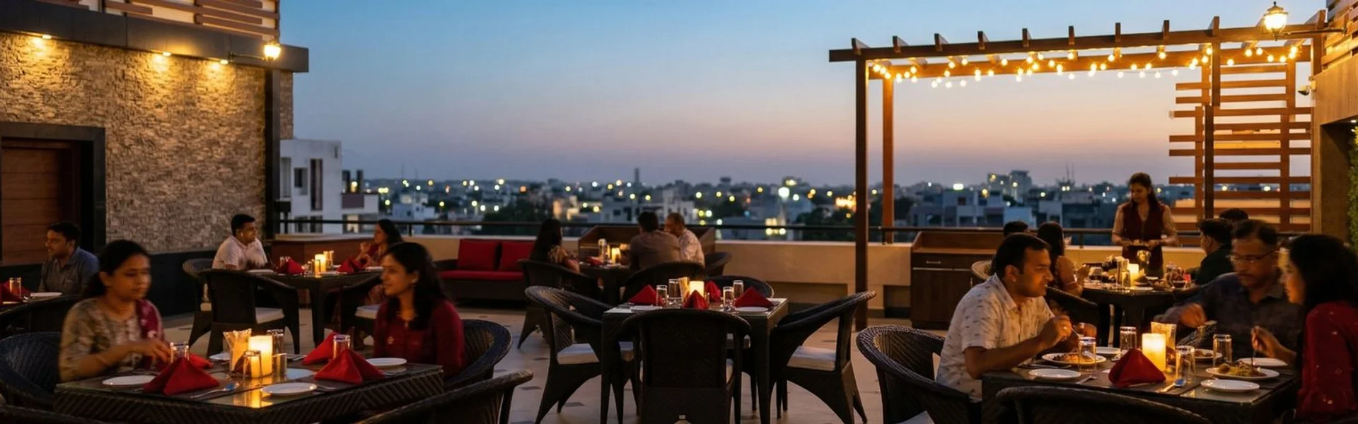 360 Rooftop Restaurant evening ambiance at Hotel Aram Jamnagar