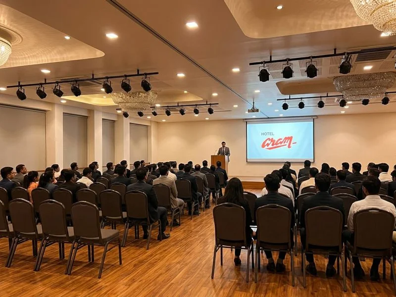 Corporate meeting in theatre-style presentation setup