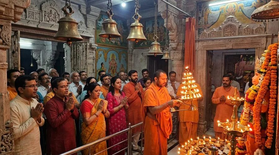 Evening prayers at Bala Hanuman Temple with devotees and warm lighting
